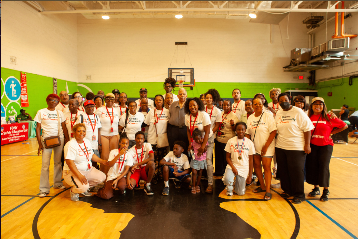 Showing Hearts and Queens Community Closets volunteers at a distribution event